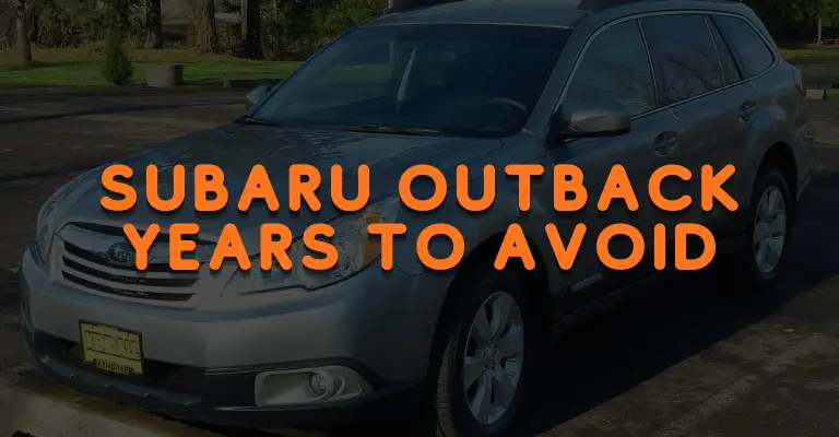 subaru outback sitting in my driveway broken down because it's not reliable